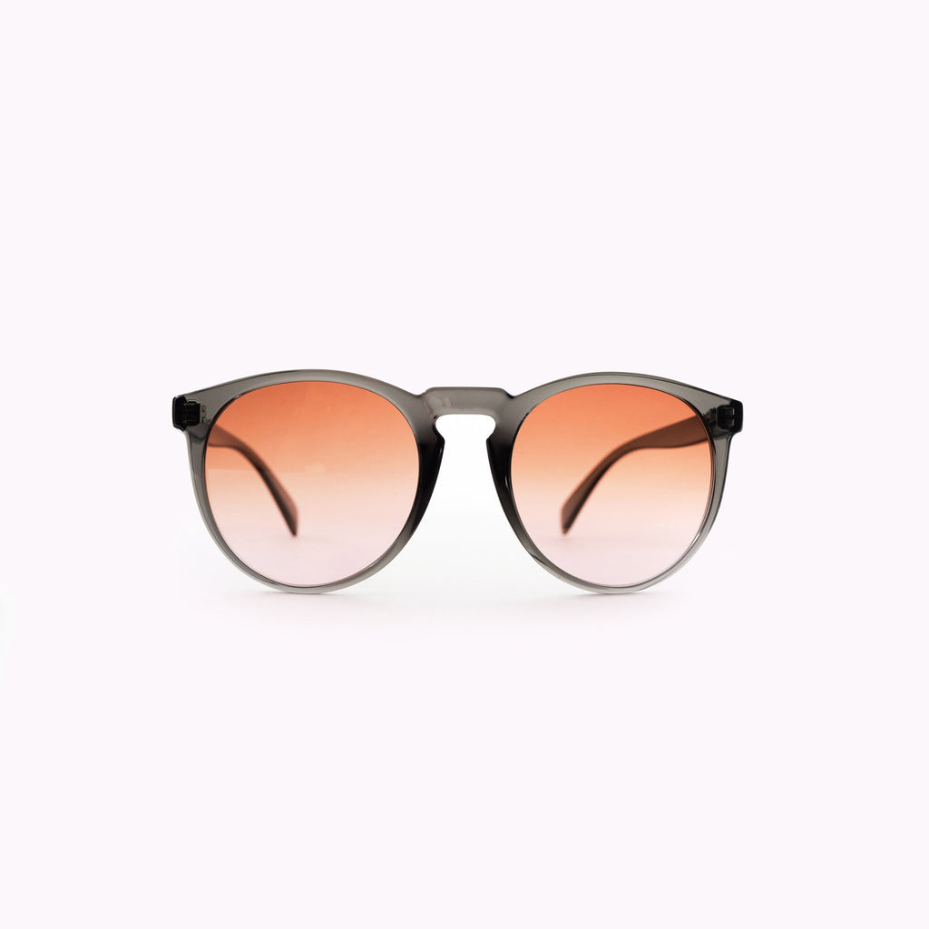 Oversized grey sunglasses that are handmade in italy
